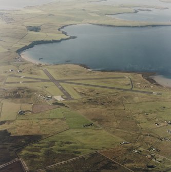 Oblique aerial view from SE.