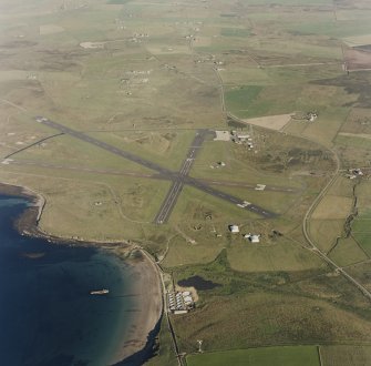 Oblique aerial view from NW.