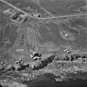 Oblique aerial view of Orkney, Flotta, of Neb and Gate Second World War coast (6 and 12-pounder) batteries and the combined observation post, taken from the S.