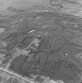 Aerial view of Orkney, Flotta, Neb and Gate Second World War coast batteries, water tank and barrage balloon site from the SE.