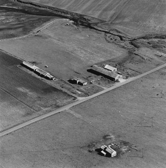 Oblique aerial view of Orkney, Hoy, Lyness, Royal Naval Oil terminal, view from NW of E part of the accommodation camp, ancillary buildings to the E of the road.