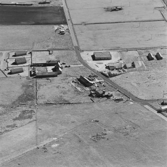 Oblique aerial view of Orkney, Hoy, Lyness, Royal Naval Oil Terminal, view from N, of the Haybrake Camp area with the site of the C.P.O.'s and P.O.'s and ratings camp to the W of the road.