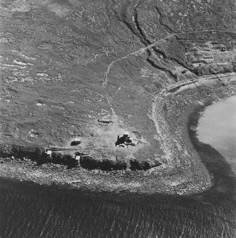 Oblique aerial view of Orkney, Hoy, taken from the E, Scad Head coast battery, searchlight positions, engine house with the accommodation camp in the background.