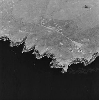 Oblique aerial view of Orkney, South Ronaldsay, Hoxa Head, taken from the SW.  Visible is Second World War Hoxa Battery and the two open gun-emplacements First World War Hoxa Battery.