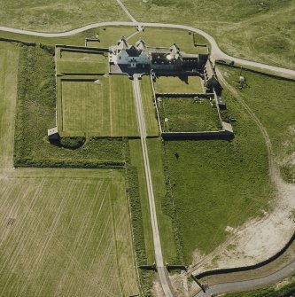 Aerial view of Orkney, Bay of Skaill, Skaill House, gardens, and dovecot, taken from the SE.