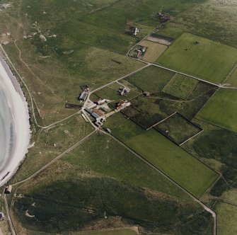Aerial view of Sanday, Scar farmhouse and steading, taken from the SW.  Also visible is Burness windmill