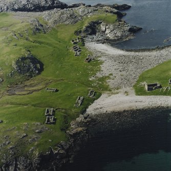 Oblique aerial view centred on the remains of the fishing station, taken from the SE.