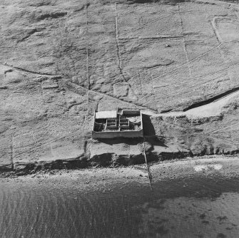 Oblique aerial view centred on the pony pound and the remains of the enclosures, taken from the SE
