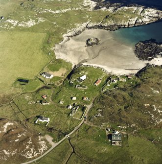 Oblique aerial view of Sorisdale centred on cottages, taken from the W.