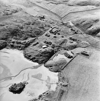 Oblique aerial view of Sorisdale centred on cottages, taken from the ENE.