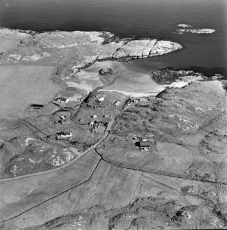 Oblique aerial view of Sorisdale centred on cottages, taken from the W.