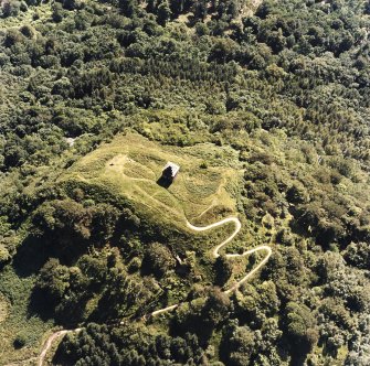 Oblique aerial view centred on the tower and remains of the fort, taken from the N.