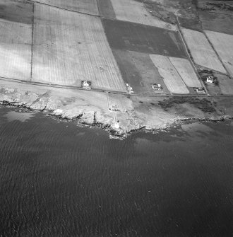 Oblique aerial photograph of Lochindaal lighthouse, Islay, taken from the SE.