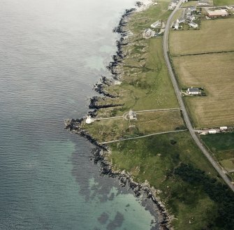 Oblique aerial photograph of Loch Indaal Lighthouse, Islay, taken from the NNE.