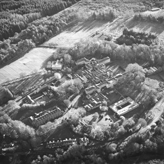 Oblique aerial view centred on the hospital and asylum, taken from the N.