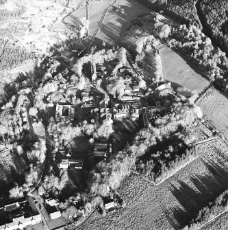 Oblique aerial view centred on the hospital and asylum, taken from the SW.