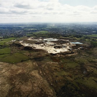 General oblique aerial view looking across the quarry towards Milngavie and Bearsden, taken from the WNW.