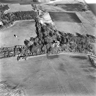 Lawhead House, oblique aerial view, taken from the SSW, showing the country house in the centre, Lawhead Croft cottage and a dovecot in the centre left, and The Lodge at Lawhead at the top edge of the photograph.