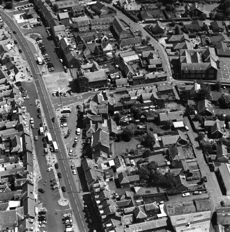 Oblique aerial view of Biggar High Street centred on the Corn Exchange, taken from the W.