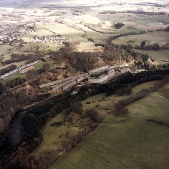 General oblique aerial view looking over New Lanark towards Lanark, taken from the WSW.