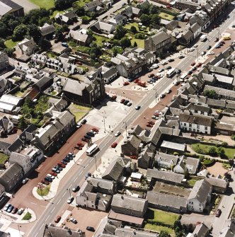 Oblique aerial view of Biggar High Street centred on the Corn Exchange, taken from the NNE.