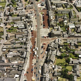Oblique aerial view of Biggar High Street centred on the Corn Exchange, taken from the WSW.