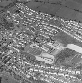 Oblique aerial view of Kilsyth centred in the school, taken from the SE.