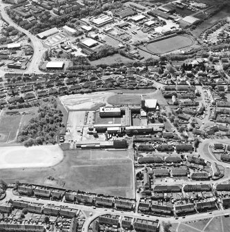 Oblique aerial view of Kilsyth centred in the school, taken from the NNW.