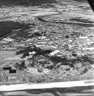 Ardeer, Nobel's Explosives Factory, oblique aerial view, centred on magazines, with South Africa House (the canteen) centre left.