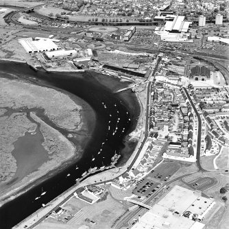 Aerial view of Irvine Harbour, the Scottish Maritime Museum (including SV Carrick), the sawmill and Ayrshire Metal Products, taken from the WSW.