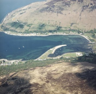 Oblique aerial view of Lochranza centred on the remains of the castle, taken from the SW.