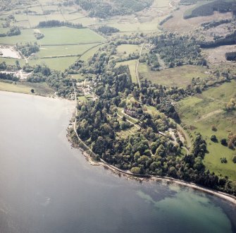 General oblique aerial view centred on the country house and walled garden, taken from the E.