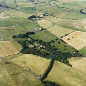 General oblique aerial view looking across the country house, taken from the SW.