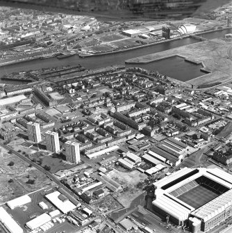 Oblique aerial view of Govan and Ibrox Stadium.