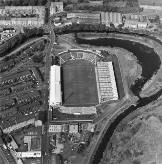 Maryhill, oblique aerial view, centred on Firhill Park and the Forth and Clyde Canal.