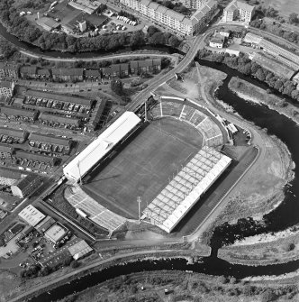 Maryhill, oblique aerial view, centred on Firhill Park and the Forth and Clyde Canal.