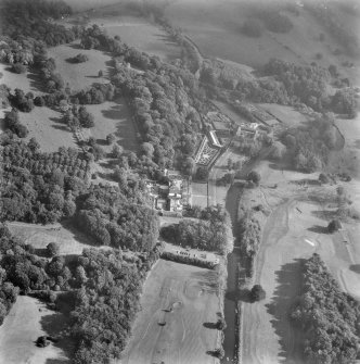 Glasgow, Pollok House.
Oblique aerial view from North-West showing house, gateway, dovecot and castles.