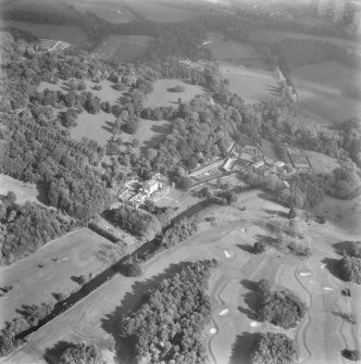 Glasgow, Pollok House.
Oblique arerial view from North-West showing house, gateway, dovecot and castles.