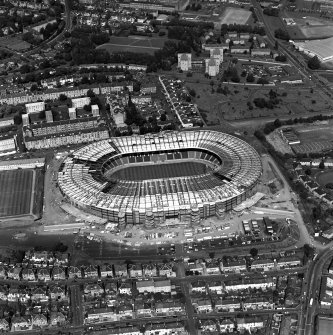 Oblique aerial view of Hampden Park under reconstruction.