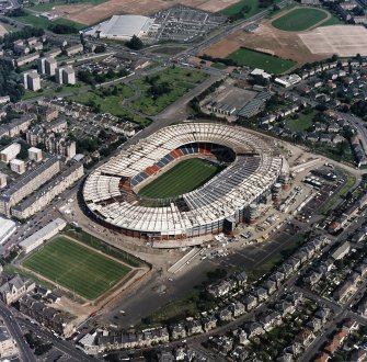 Oblique aerial view of Hampden Park under reconstruction.