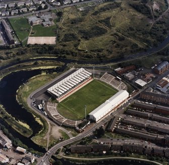 Maryhill, oblique aerial view, centred on Firhill Park and the Forth and Clyde Canal.