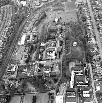 Oblique aerial view centred on the hospital, taken from the ESE.
