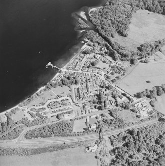 Oblique aerial view centred on the village of Luss, taken from the WNW.