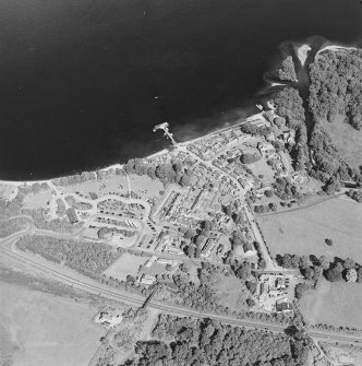 Oblique aerial view centred on the village of Luss, taken from the W.