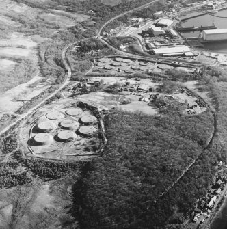 Oblique aerial view centred on the military training camp and oil fuel depots with the submarine base adjacent, taken from the NNW.