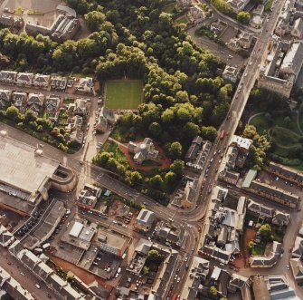 Oblique aerial view of Hamilton centred on Hamilton Parish Church with the halls adjacent, taken from the E.
