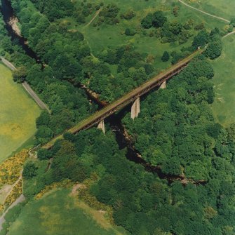 Oblique aerial view centred on the railway viaduct, taken from the S.