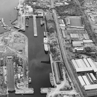 Greenock, James Watt Dock, oblique aerial view, taken from the NW. Cappielow is visible in the top right-hand corner of the photograph.