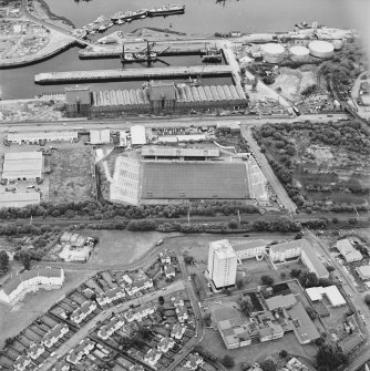 Greenock, James Watt Dock, oblique aerial view, taken from the SSW. Cappielow is visible in the centre of the photograph.