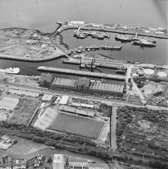 Greenock, James Watt Dock, oblique aerial view, taken from the SSW. Cappielow is visible in the foreground.
